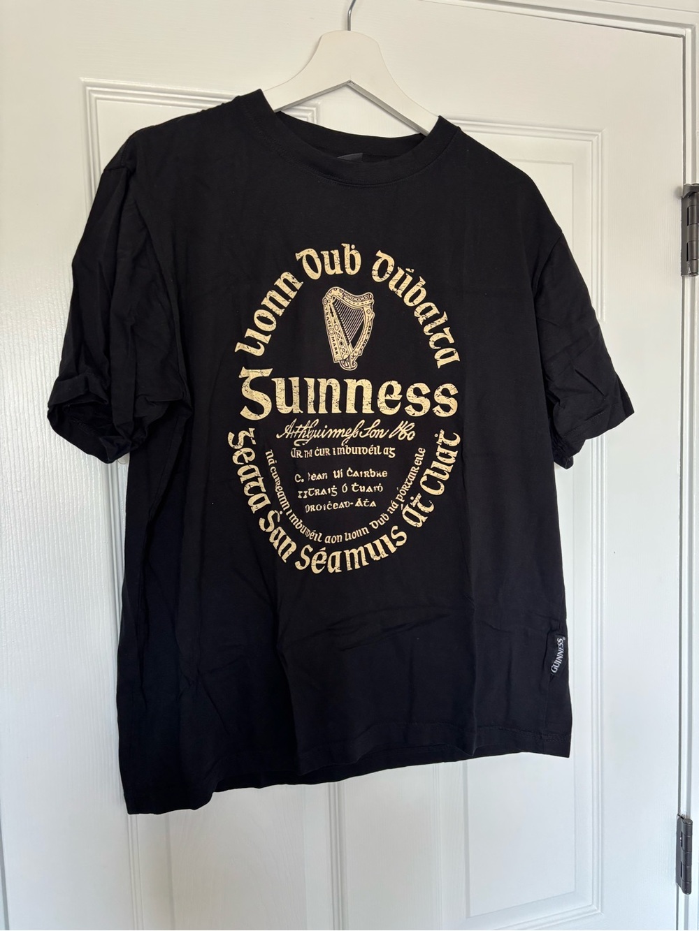 Vintage Guinness Black Tee with Gold Crest Graphic